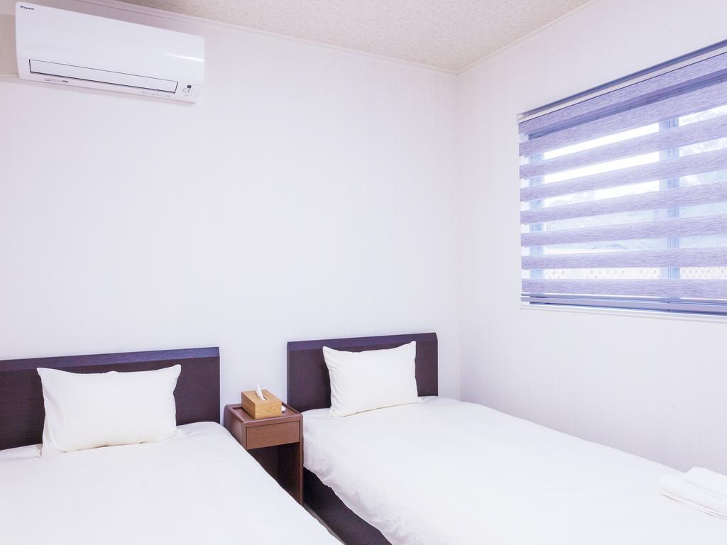 Kariyushi Condominium Resort Nago Rb Villa Nakijin Exteriör bild